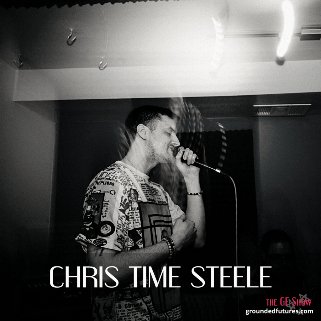 A black and white photo of chris time steele singing into a handheld microphone. Text across the bottom reads "chris time steele" with the Grounded Futures logo in the bottom right corner.